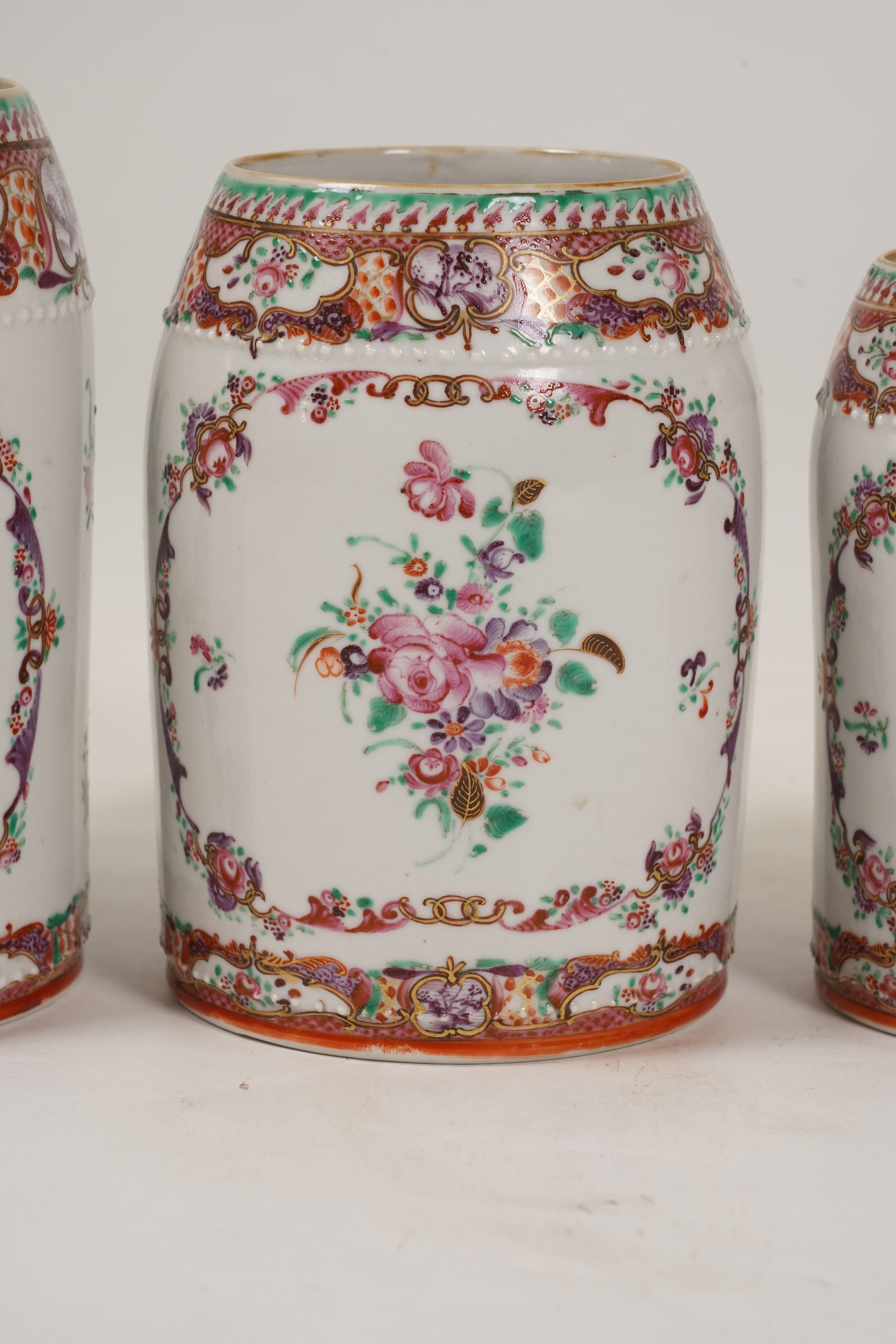 A graduated set of three Chinese export famille rose mugs, Qianlong period